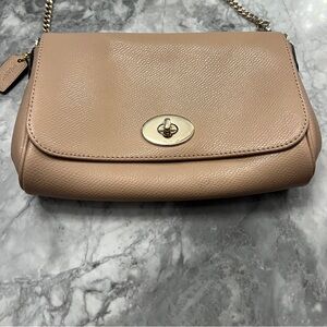Lovely Coach tan clutch with  gold chain